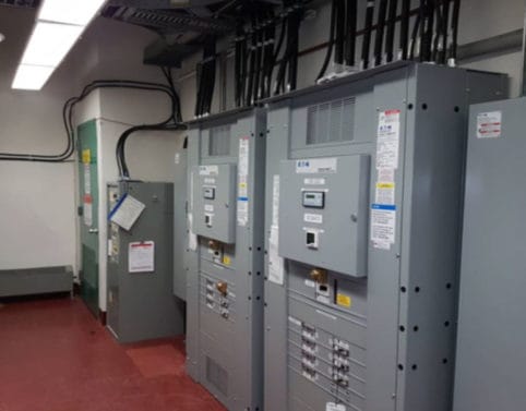 Retrofit vault and new 2000 AMP service into existing commercial building.